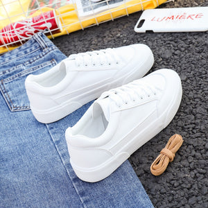 Women's White Flat Lace-up Sneakers